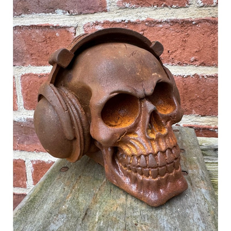 Rusty Cast Iron Skull With DJ Headphones